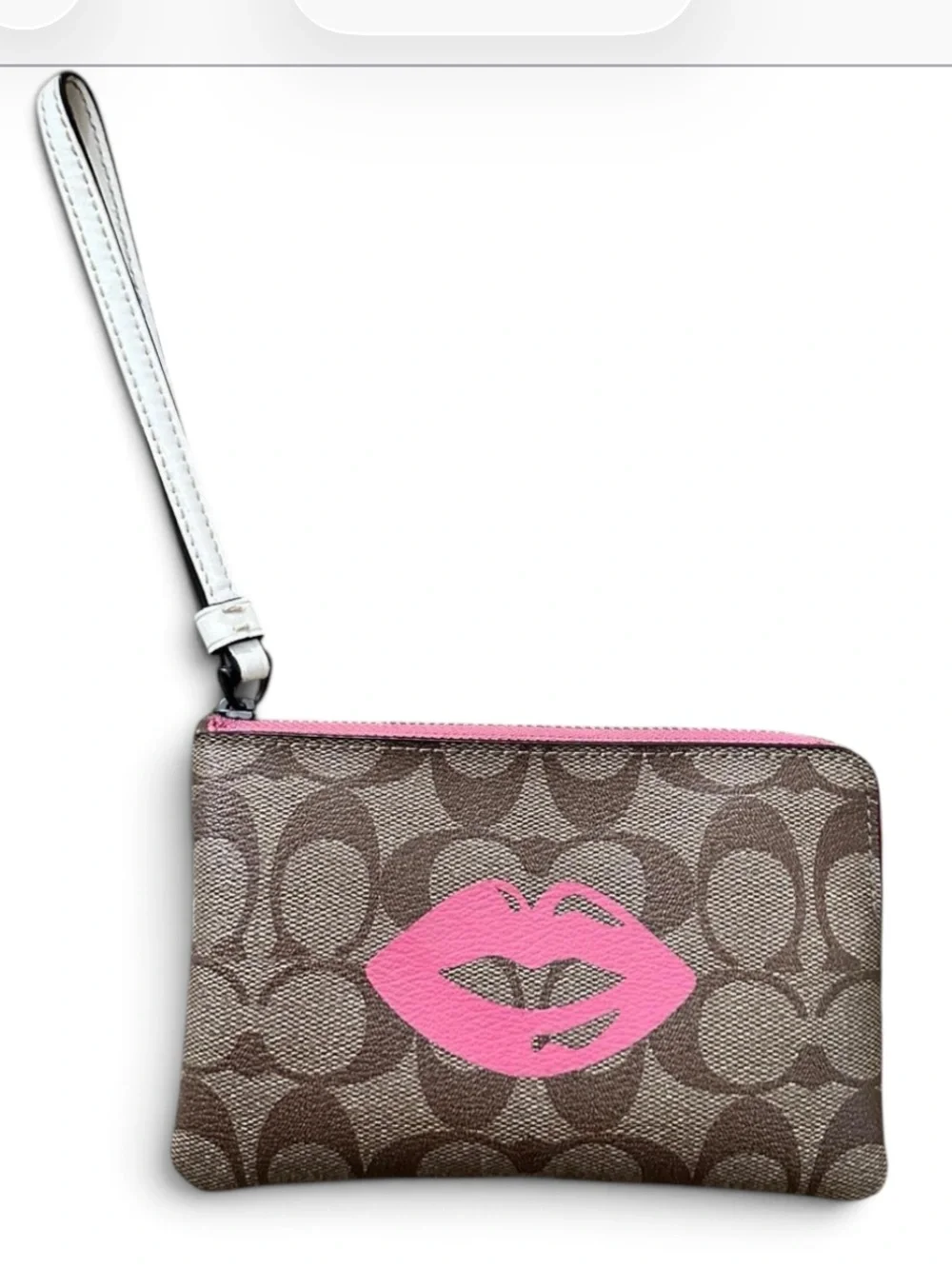 Coach Brown Signature Wristlet with Pink Lip Print near new